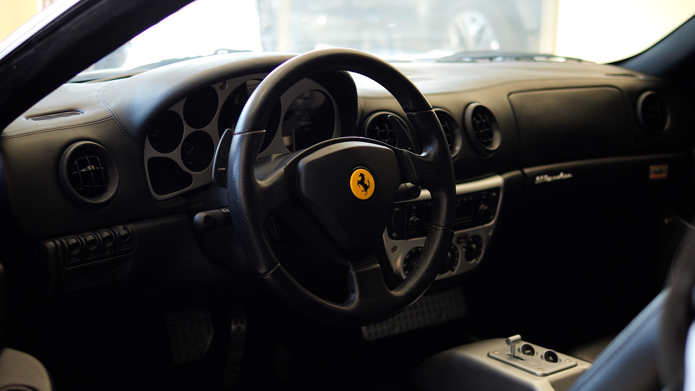 Ferrari cockpit photographed at 1st Choice Motors